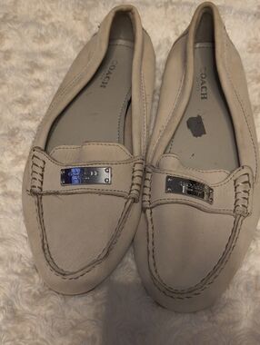 Coach Women's Light Beige Leather Moccasin Loafers with Silver Plaque